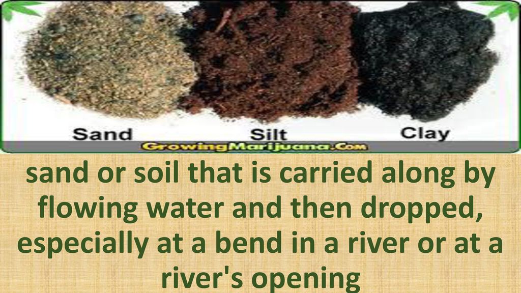 sand or soil that is carried along by flowing water and then dropped, especially at a bend in a river or at a river s opening